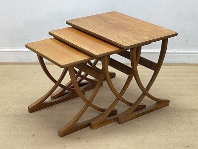 Lot 728 - NATHAN FURNITURE; a nest of three teak tables...