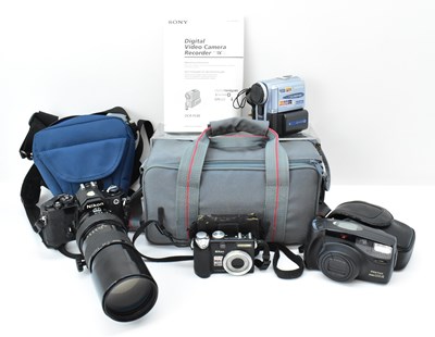 Lot 409 - Various cameras including a Nikon FM 2516232,...