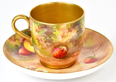 Lot 207 - ROYAL WORCESTER; a hand-painted demitasse gilt-...