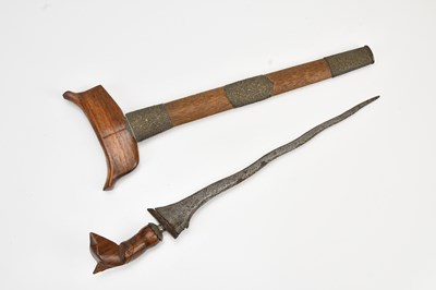 Lot 1080 - A late 19th century kris, with rosewood and...