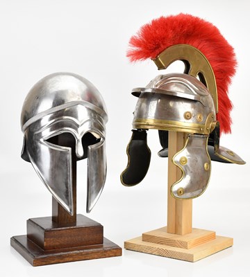 Lot 622 - A reproduction Roman Centurion helmet and a...