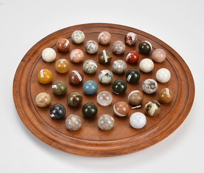 Lot 478 - A contemporary solitaire board containing...