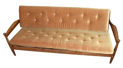 Lot 1434 - A mid century teak day bed, with button...