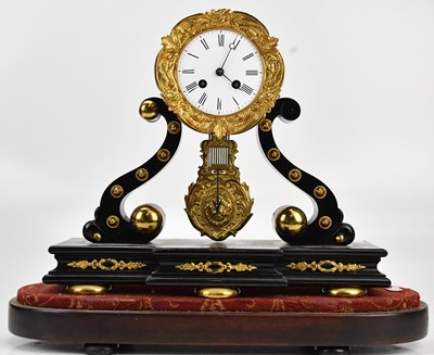 Lot 339 - A late 19th century French brass and ebonised...