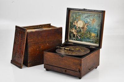 Lot 645 - An early 20th century walnut cased polyphon,...