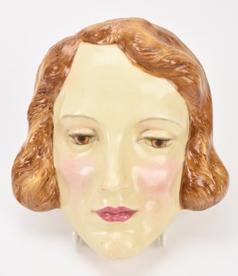 Lot 356 - ROYAL DOULTON; a rare Art Deco wall mask...