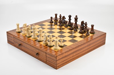 Lot 515 - A contemporary chess board with two drawers...