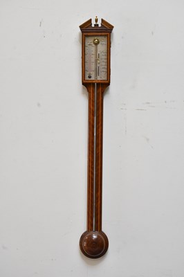 Lot 404 - COMITTI; a reproduction inlaid mahogany stick...