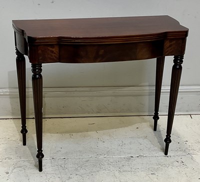 Lot 1315 - A 19th century inlaid mahogany fold-over games...