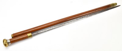 Lot 1078 - A late 19th century swordstick with brass cap...