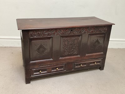 Lot 1060 - An 18th century oak mule chest, with hinged...