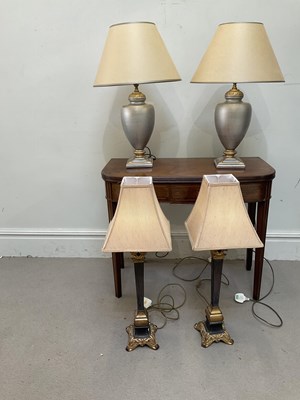 Lot 2243 - A pair of modern silver coloured table lamps,...