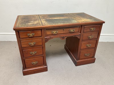Lot 1177 - An Edwardian mahogany pedestal desk, with a...