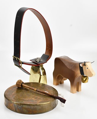 Lot 513 - A vintage cow bell with leather strap, an...