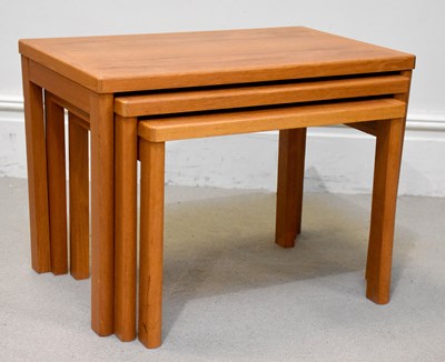 Lot 56 - A Mid-century teak nest of three coffee tables...