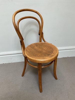 Lot 1303 - A vintage Thonet style bentwood cafe chair...