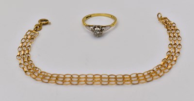Lot 576 - An 18ct gold and synthetic diamond ring, size...