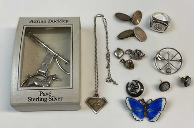 Lot 573 - A collection of various silver brooches and...