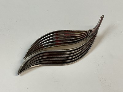 Lot 577 - AKSEL HOLMSEN; a Norwegian silver brooch in...