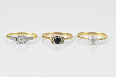 Lot 494 - An 18ct yellow gold diamond illusion set dress...