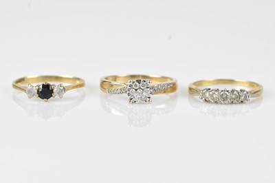 Lot 495 - A 9ct yellow gold diamond set five stone dress...
