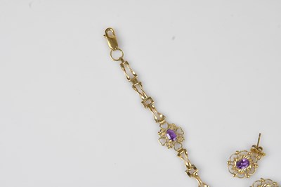 Lot 46 - A 9ct yellow gold amethyst set bracelet,...