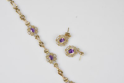 Lot 46 - A 9ct yellow gold amethyst set bracelet,...