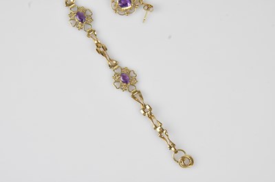 Lot 46 - A 9ct yellow gold amethyst set bracelet,...