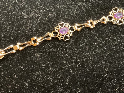 Lot 46 - A 9ct yellow gold amethyst set bracelet,...