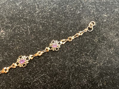 Lot 46 - A 9ct yellow gold amethyst set bracelet,...