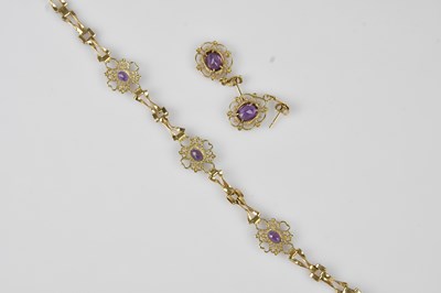 Lot 46 - A 9ct yellow gold amethyst set bracelet,...
