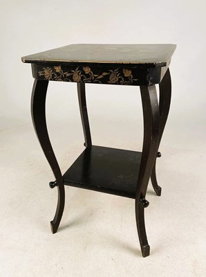 Lot 679 - A lacquered two tiered table of small...
