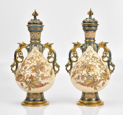 Lot 1489 - ROYAL WORCESTER; a pair of twin handled lidded...