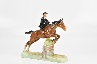 Lot 1469 - BESWICK; a ceramic figure of 'Huntswoman',...