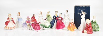 Lot 1448 - ROYAL DOULTON; a collection of figures...