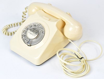 Lot 363 - A vintage BT telephone in cream, with a rotary...