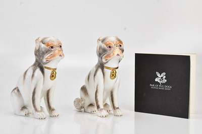 Lot 1264 - SUTHERLAND; a pair of pug dogs, height 23cm,...