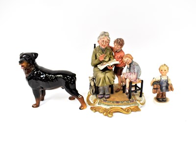 Lot 676 - A Beswick model of a dog, a Hummel figure of a...
