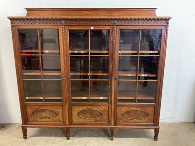 Lot 818 - An early 20th century triple door glazed...