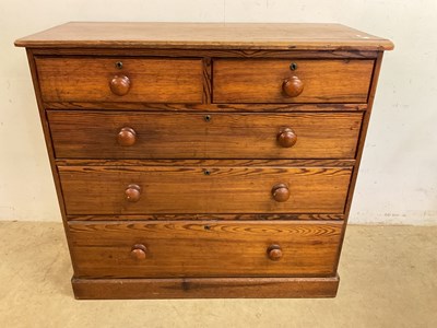 Lot 731 - A 20th century pitch pine chest of drawers,...