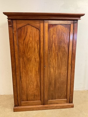 Lot 714 - A mahogany double wardrobe with brass and...