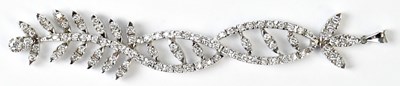 Lot 607 - An 18ct white gold and diamond articulated...