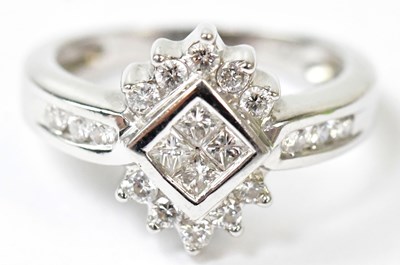 Lot 594 - An 18ct white gold ring set with diamonds,...