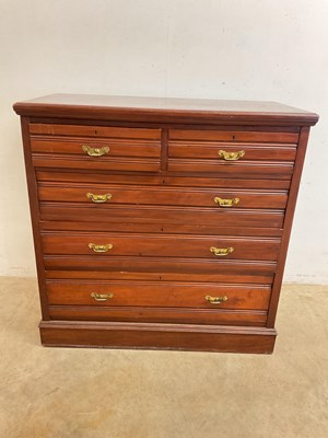 Lot 814 - A 20th century chest of drawers with two short...
