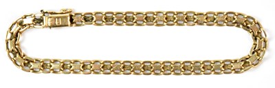 Lot 598 - A 9ct yellow gold bracelet with X-shaped links,...