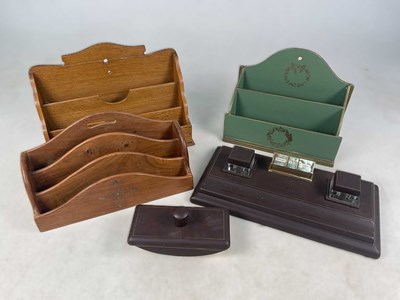Lot 29 - A group of desk items comprising three wooden...