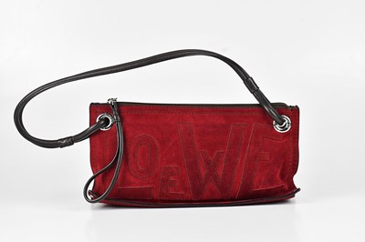 Lot 1351 - LOEWE; a red suede pochette shoulder bag, with...