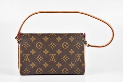 Lot 1331 - LOUIS VUITTON; a coated canvas monogram...