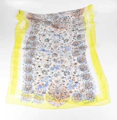 Lot 1257 - HERMÈS; a yellow, orange and grey Mousseline...