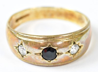 Lot 587 - A 9ct yellow gold ring set with a central...